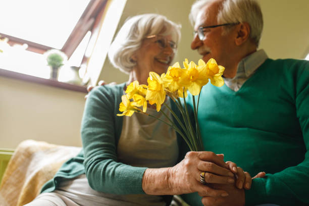 istock Romantic senior couple having a bonding moment on their anniversary 1390980426