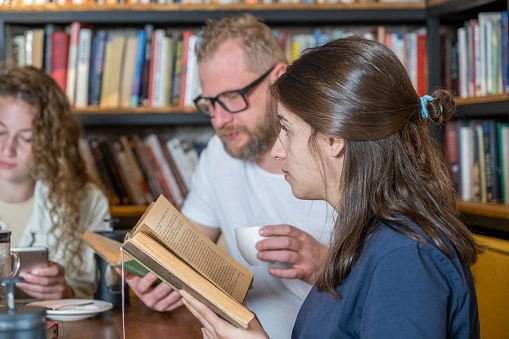 Group Of People Having A Book Club Meeting