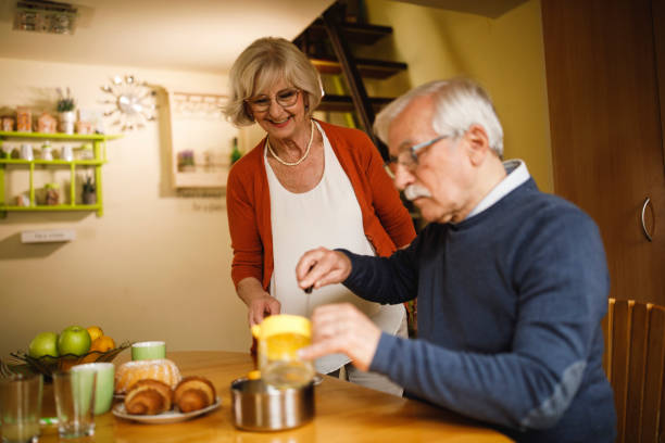 istock Senior couple preparing a refreshing lemonade to enjoy while relaxing 1390981265