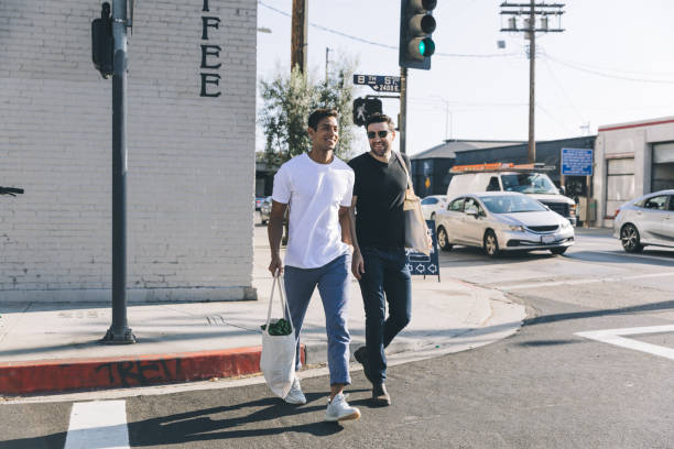 istock Happy couple strolls through Los Angeles's arts district 1390982486
