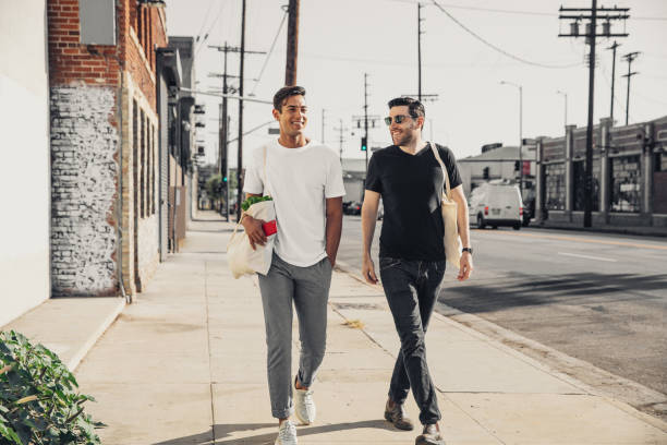 istock Happy couple strolls through Los Angeles's arts district 1390982542