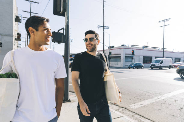 istock Happy couple strolls through Los Angeles's arts district 1390982599