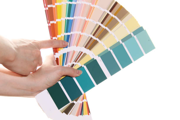 istock Hand holds color pantone 1390982747
