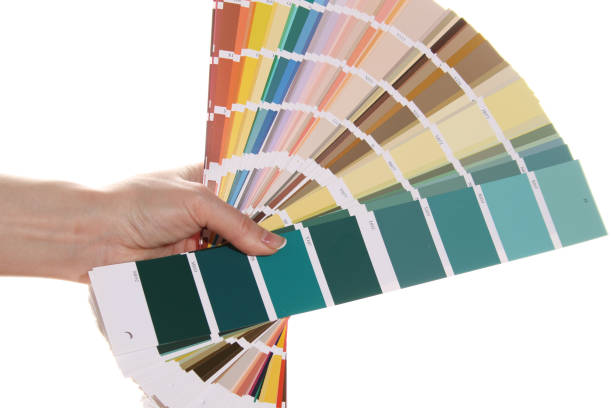 istock Hand holds color pantone 1390982767