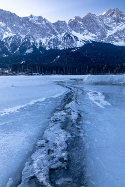 istock Cold morning at frozen lake Eibsee 1390985096