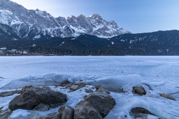 istock Cold morning at frozen lake Eibsee 1390985265