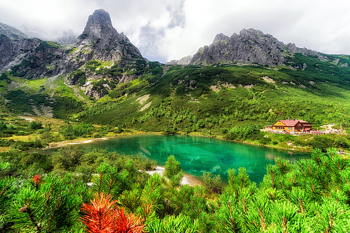 Tarn Zelene pleso and cottage in High Tatras mountains at Slovakia. Alpine summer mountainscape