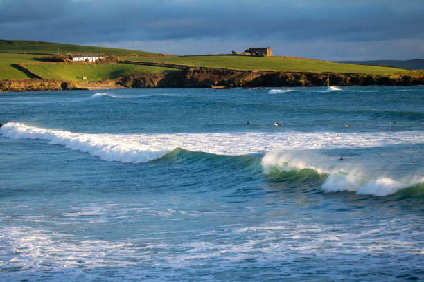 istock Surfers looking for that great big wave in West Cork Ireland 1390988795