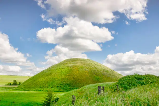 Silbury Hill, the prehistoric artificial chalk mound near Avebury in the England, Wiltshire, a UNESCO World Heritage Site.