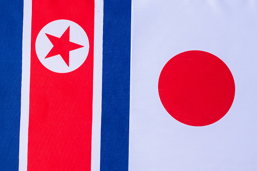 Japan against North Kores flags. Sanctions, war, conflict, Politics and relationship concept