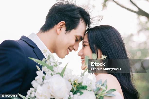 Image Of Young Asian Bride And Groom Stock Photo - Download Image Now - Wedding, Couple - Relationship, Filipino Ethnicity
