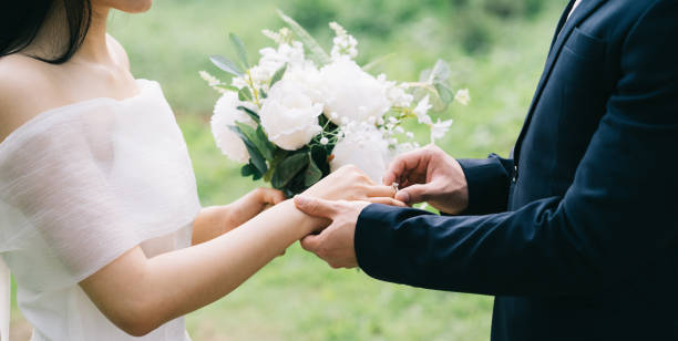 image of young asian bride and groom - engagement wedding wedding ceremony ring imagens e fotografias de stock