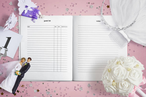 Blank wedding planner book for copy space on a pink background
