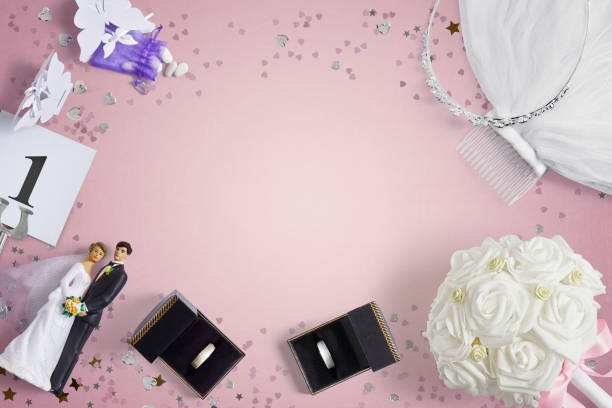istock Wedding accessories on a pink background with copy space 1390991536