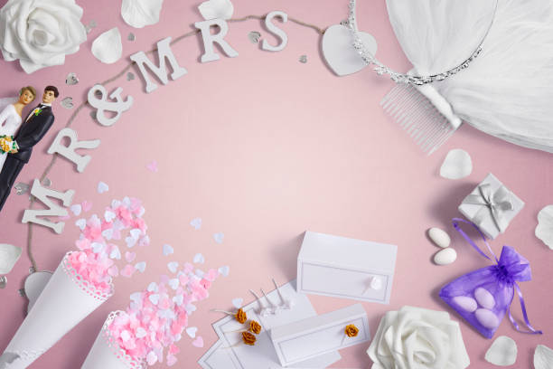istock Wedding accessories on a pink background with copy space 1390991815