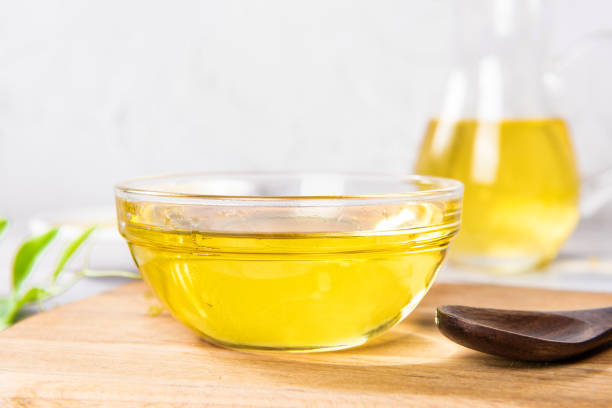 istock cooking oil in a glass bowl on table 1390993717