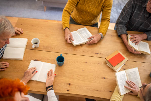 istock Unrecognizable people attending the book reading club 1390994298