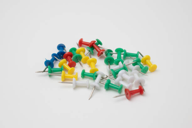 istock close up of various pushpins on white background with clipping path 1390994306