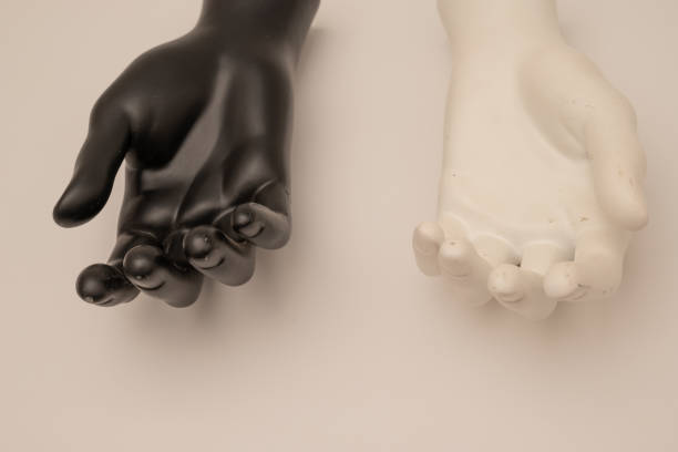 istock Old shabby mannequin hands on a white background 1390994332