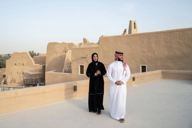 istock Middle Eastern couple exploring At-Turaif ruins near Riyadh 1390994393