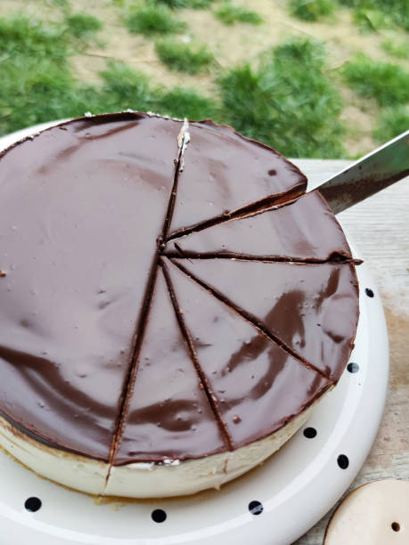 istock chocolate cheesecake cut with a knife, bird's milk cake 1390994434
