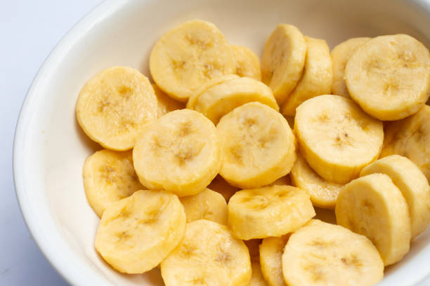 istock Banana slices isolated on white background 1390995578