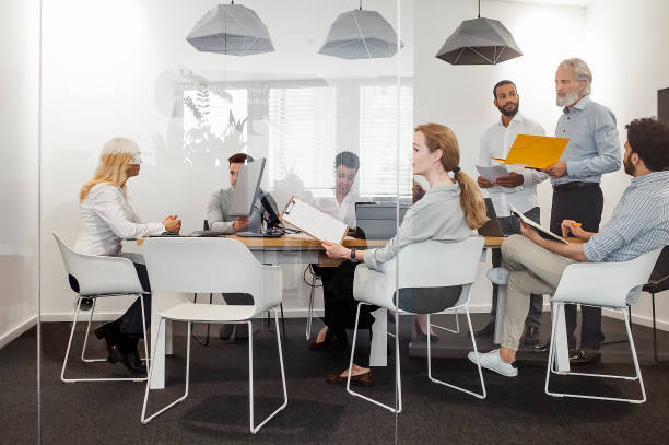 istock Business People Having a Meeting 1390996019