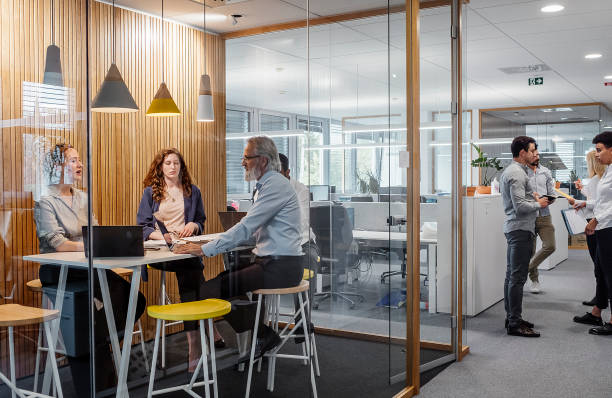 istock Business People Having a Meeting 1390996034