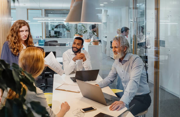 istock Business People Having a Meeting 1390996046