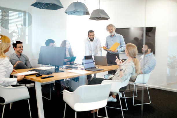 istock Business People Having a Meeting 1390996071