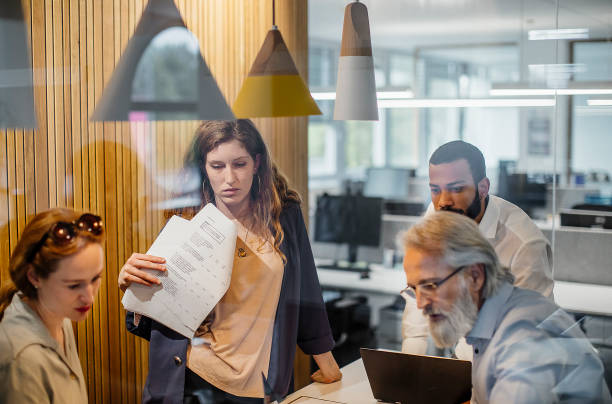istock Business People Having a Meeting 1390996102