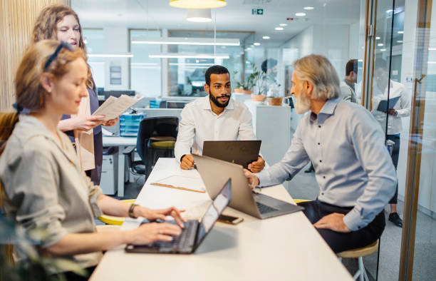 istock Business People Having a Meeting 1390996115