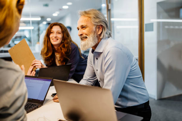 istock Business People Having a Meeting 1390996148