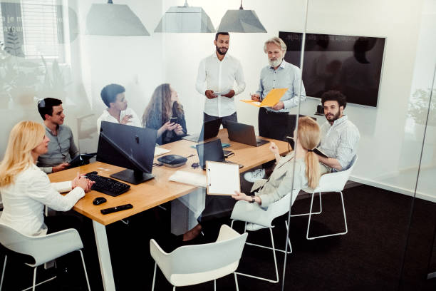 istock Business People Having a Meeting 1390996176