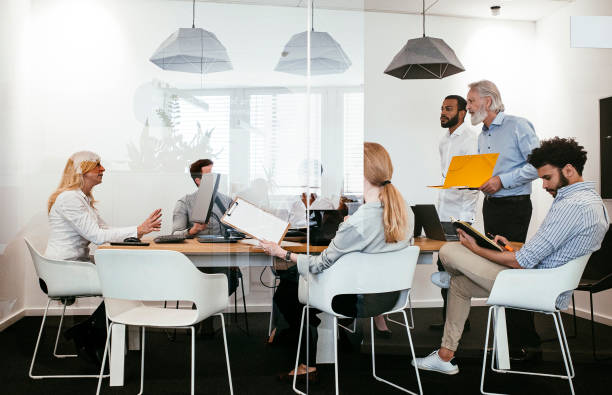 istock Business People Having a Meeting 1390996183