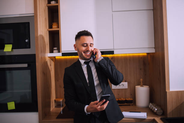 istock Overworked businessman at home 1390998786