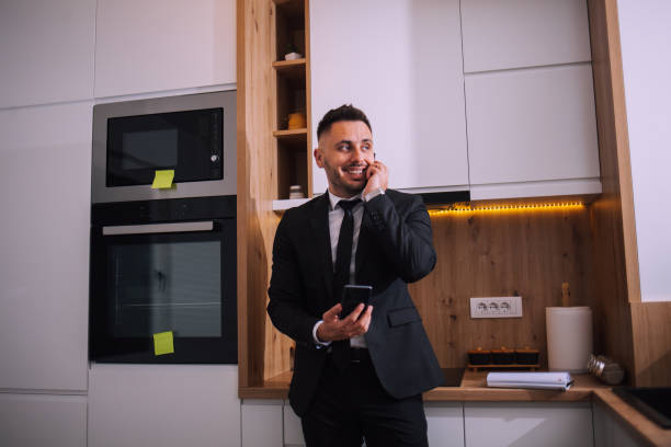 istock Overworked businessman at home 1390998794
