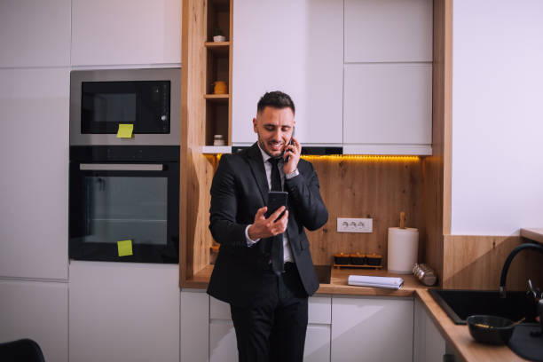 istock Overworked businessman at home 1390998887