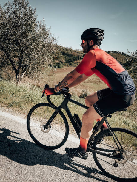 istock cyclist in Tuscany countryside 1390998956