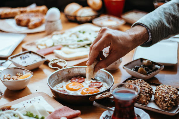 istock Turkish Breakfast,  Sunday big breakfast or brunch with white cheese and egg, Turkish spread breakfast served in the restaurant, Egg with sausage 1390999710