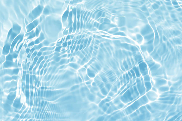 onda de água azul, fundo natural de textura de padrão de redemoinho, fotografia abstrata - superfície de água - fotografias e filmes do acervo