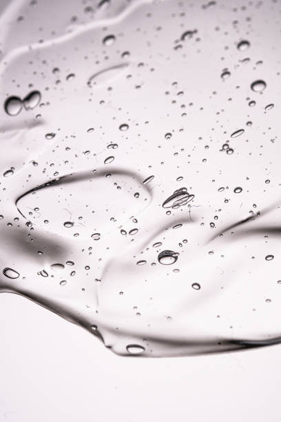 The texture of a thick cosmetic gel on a neutral background.