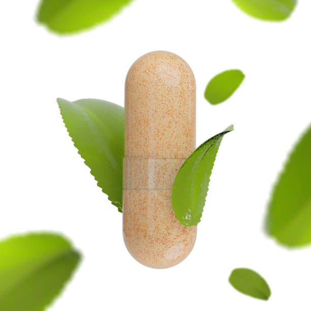 transparent herbal powder pill. natural ingredients capsule with green leafs on white background. - chinese medicine herb pill nutritional supplement imagens e fotografias de stock