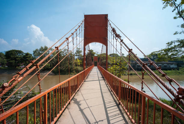 istock Bridge into Tham Chang Cave in Vang Vieng 1391004402