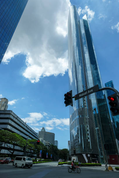 Makati, Philippines - March 2022: Skyscrapers on Makati Avenue on March 26, 2022 in Makati City, Metro Manila, Philippines.