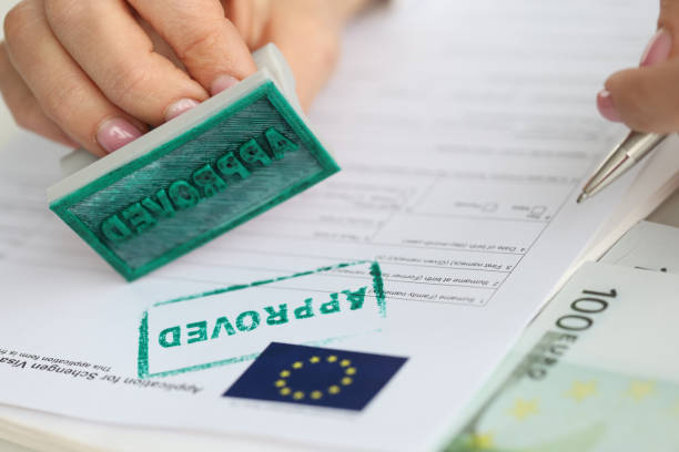 Application form seal approved for Schengen visa to European Union Application form seal approved for Schengen visa to European Union. Departure to Europe and obtaining citizenship concept schengen agreement stock pictures, royalty-free photos & images