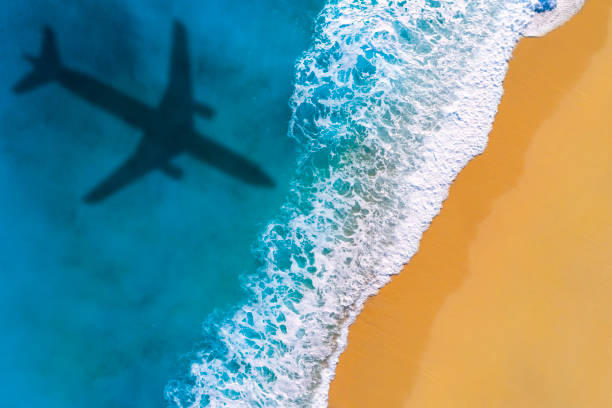 istock Summertime travel by plane 1391009381