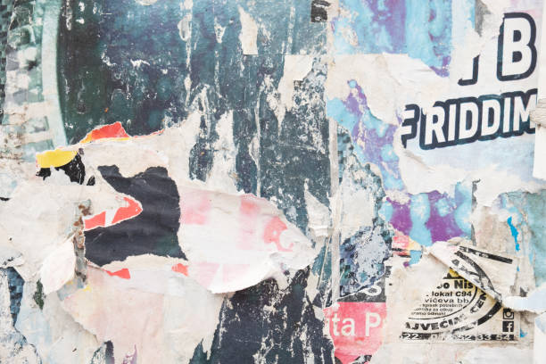 istock Old street poster background. Torn and ripped abstract paper texture 1391011637
