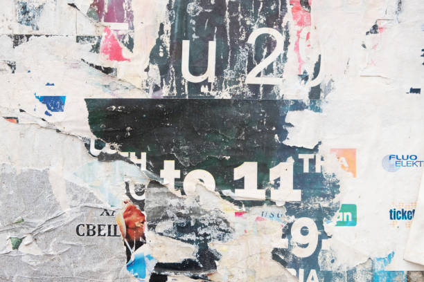 istock Old street poster background. Torn and ripped abstract paper texture 1391011638