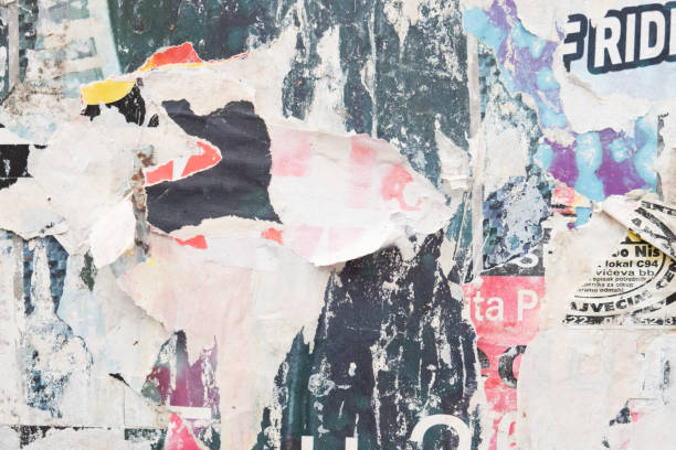 istock Old street poster background. Torn and ripped abstract paper texture 1391011639